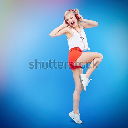 Сток-фото: женщины · подростку · прослушивании · музыку · наушники