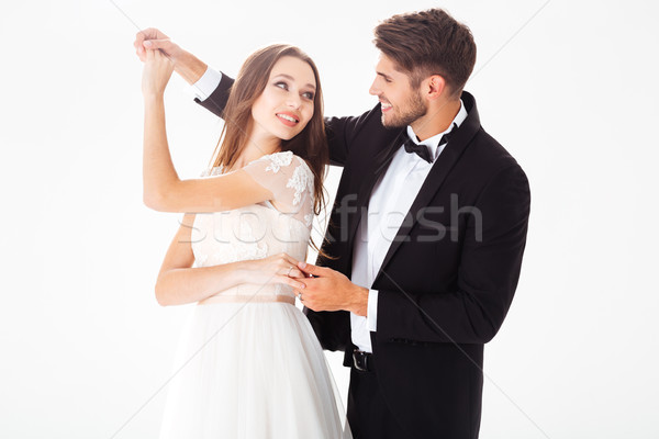 Portrait of dancing newlyweds Stock photo © deandrobot