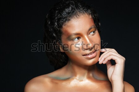 Beauty portrait of smiling african young woman with creative makeup Stock photo © deandrobot