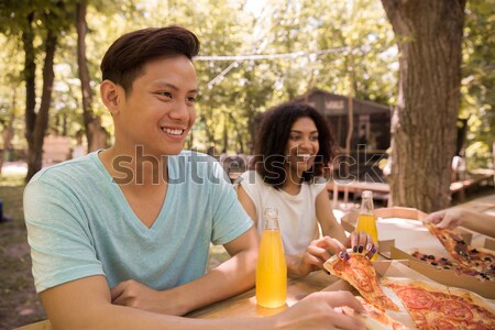 Alegre jóvenes amigos estudiantes aire libre Foto stock © deandrobot