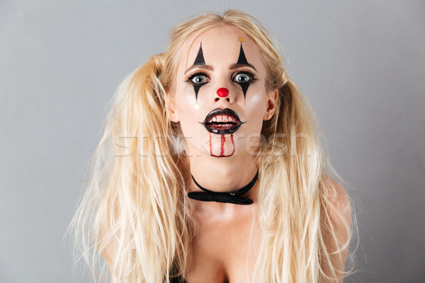 Close-up portrait of mystical blonde woman in halloween make-up Stock photo © deandrobot