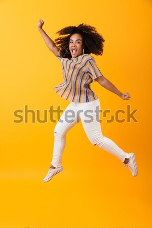 Fiatal boldog vicces nő lezser ruházat Stock fotó © deandrobot