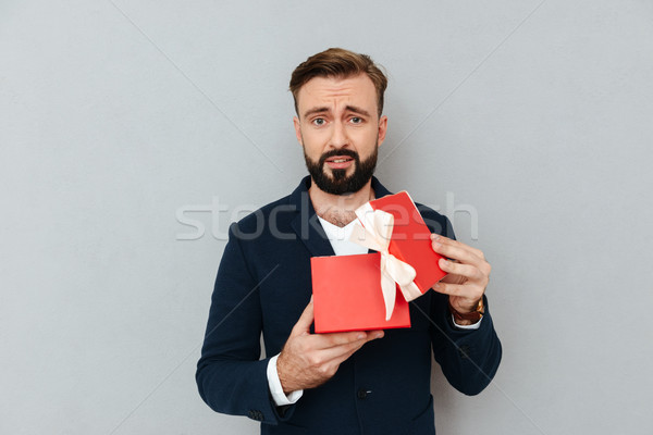 Stock foto: Verärgert · traurig · Mann · Anzug · halten · Geschenk