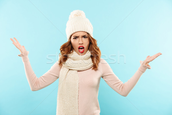 Angry lady with opened mouth looking camera isolated Stock photo © deandrobot