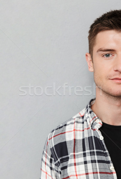 Half portrait of a serious man Stock photo © deandrobot