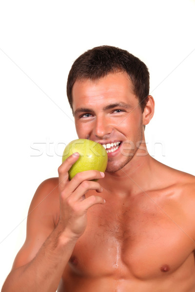 [[stock_photo]]: Jeune · homme · vert · pomme · alimentaire · main