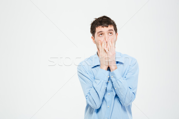 Rozczarowanie człowiek stałego odizolowany biały twarz Zdjęcia stock © deandrobot