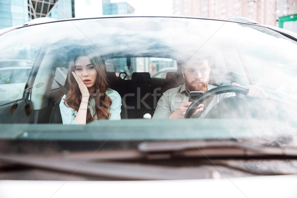 Young couple in car Stock photo © deandrobot