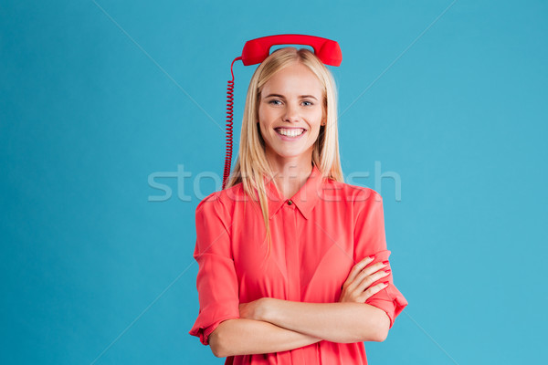 金發碧眼的女人 常設 紅色 電話 管 頭 商業照片 © deandrobot