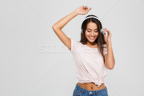 Portret gelukkig blijde asian vrouw hoofdtelefoon Stockfoto © deandrobot