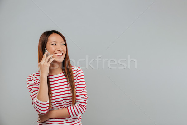 Stockfoto: Lachend · jonge · asian · vrouw · praten · telefoon