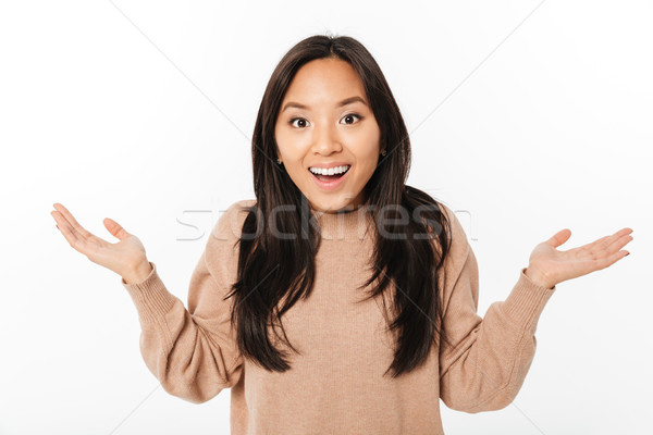 Excited shocked lady standing isolated Stock photo © deandrobot