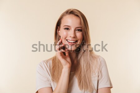 Portrait of gorgeous woman 20s with european appearance in basic Stock photo © deandrobot