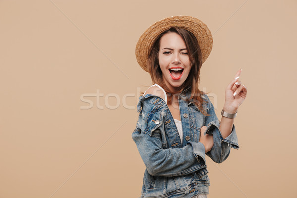 Portré izgatott fiatal lány nyár ruházat mutat Stock fotó © deandrobot