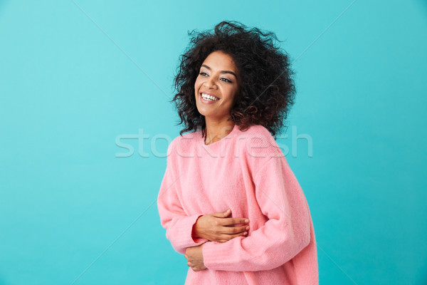 Multicolor image of pretty woman 20s with afro hairstyle laughin Stock photo © deandrobot