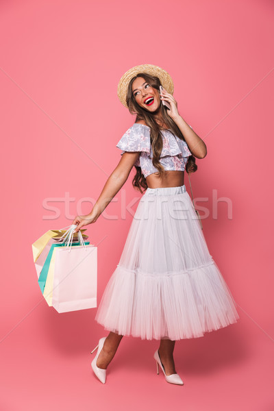 Full length portrait of glamour pretty woman wearing straw hat a Stock photo © deandrobot