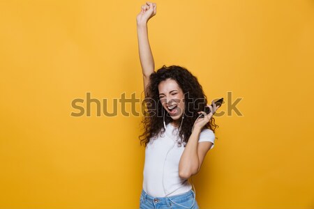 Happy sporty woman doing exercises on the floor Stock photo © deandrobot