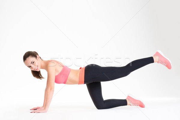 Szczęśliwy dość młodych sportsmenka fitness dres Zdjęcia stock © deandrobot