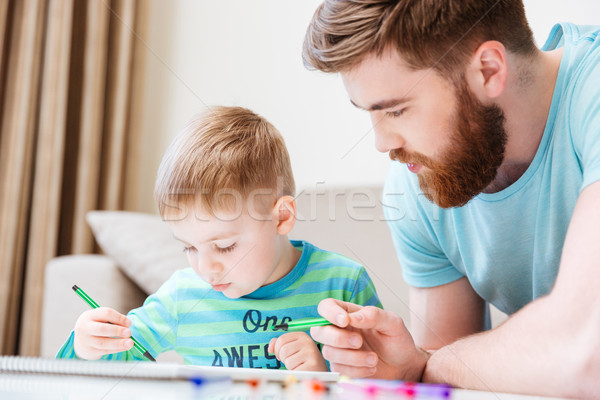 Wenig Sohn Vater Zeichnung zusammen home Stock foto © deandrobot