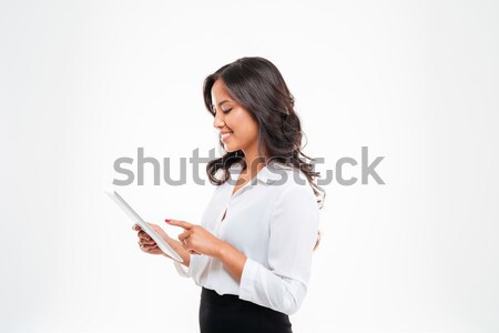 Beautiful asian businesswoman using tablet computer Stock photo © deandrobot