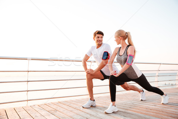 Atletisch benen samen pier Stockfoto © deandrobot