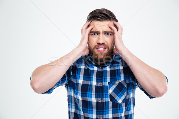 Portrait of a depressed casual man Stock photo © deandrobot