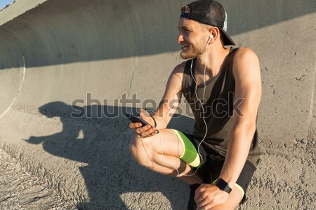 Férfi jogging tengerpart vonzó fiatalember sport Stock fotó © deandrobot