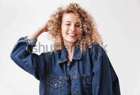 Cheerful retro man with telephone in hands. Stock photo © deandrobot