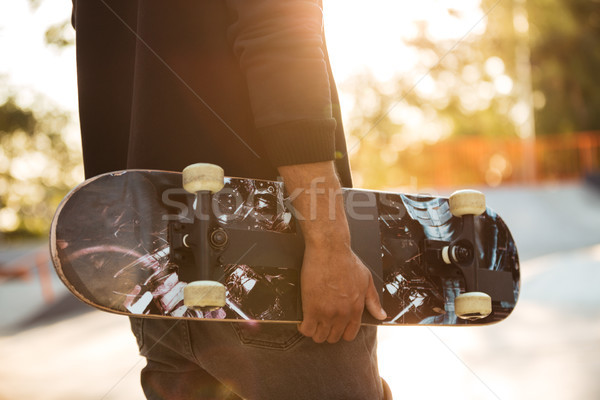 [[stock_photo]]: Africaine · homme · skateboarder · permanent · skateboard