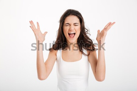 Retrato furioso menina gritando isolado branco Foto stock © deandrobot