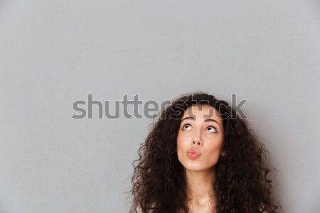 Close up portrait of pretty lady having cool curly hairstyle loo Stock photo © deandrobot