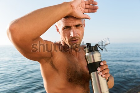 Stock photo: Portrait of a handsome shirtless sportsman