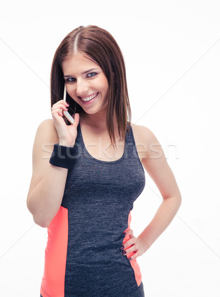 Smiling fitness cute woman talking on the phone Stock photo © deandrobot