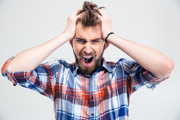 Portrait of upset man screaming Stock photo © deandrobot