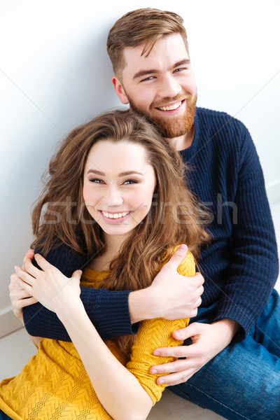 Couple looking at camera Stock photo © deandrobot