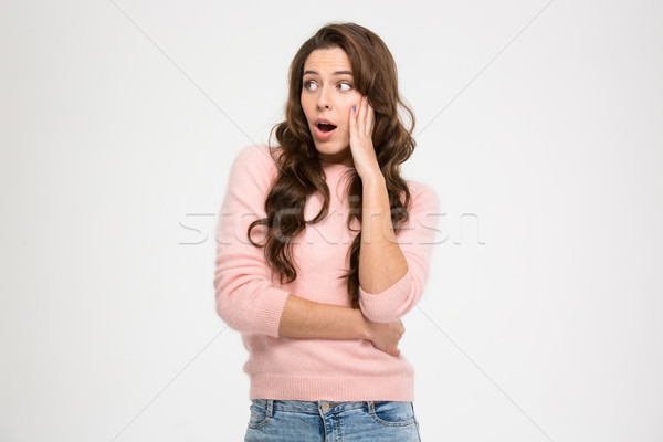Amazed young woman  Stock photo © deandrobot