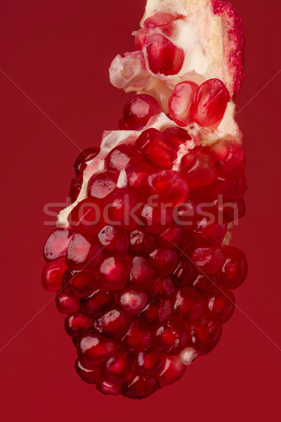 Törött gránátalma rész izolált piros természet Stock fotó © deandrobot