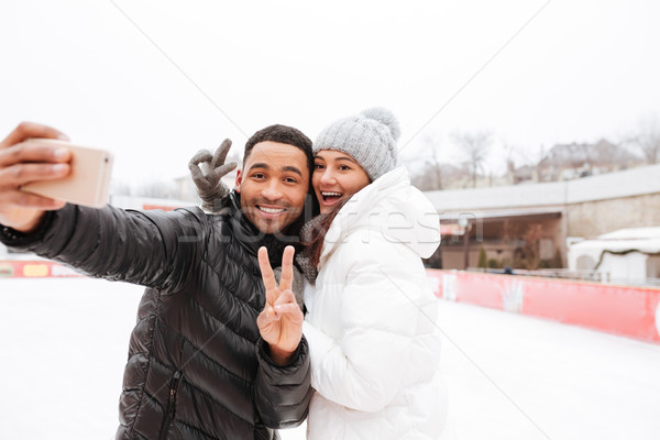 Stockfoto: Glimlachend · liefhebbend · paar · telefoon · vrede