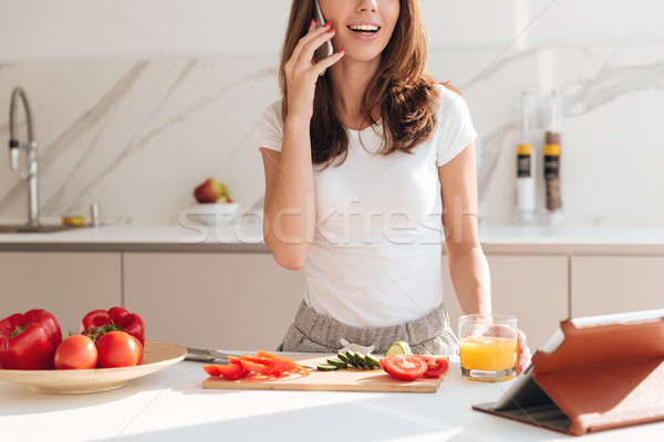 Stock photo: Cropped image of a young casual woman talking