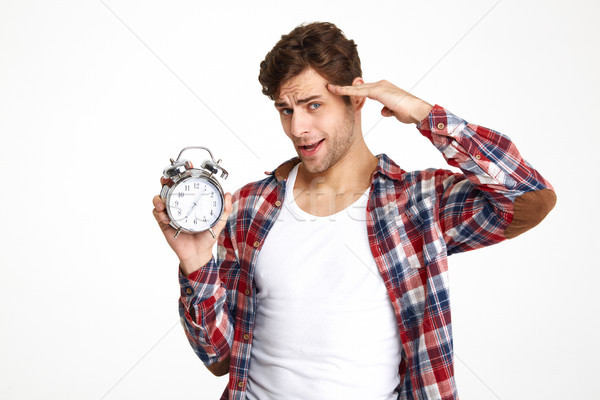 Portrait of a handsome casual man with hand at head Stock photo © deandrobot