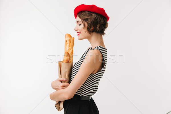 Vue de côté portrait satisfait femme béret [[stock_photo]] © deandrobot