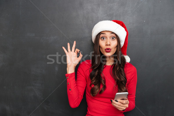 şaşırmış esmer kadın kırmızı bluz Noel Stok fotoğraf © deandrobot