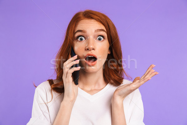 Stock photo: Portrait of an astonished young girl standing