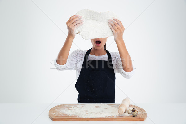 Shocked woman preparing dough for pastry Stock photo © deandrobot