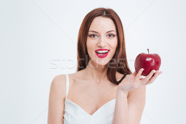 [[stock_photo]]: Femme · souriante · pomme · rouge · isolé · blanche · fille