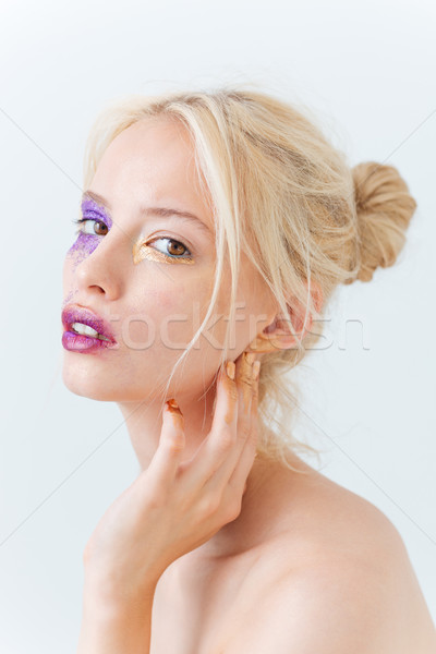 Beauty portrait of tender cute young woman with stylish makeup Stock photo © deandrobot