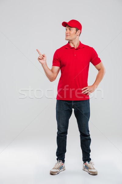 Full length picture of deliveryman Stock photo © deandrobot