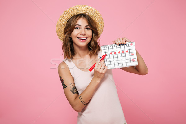 Portrait of a smiling young girl in summer hat Stock photo © deandrobot