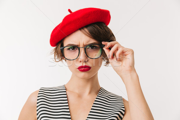 Porträt verärgert Frau tragen rot Baskenmütze Stock foto © deandrobot