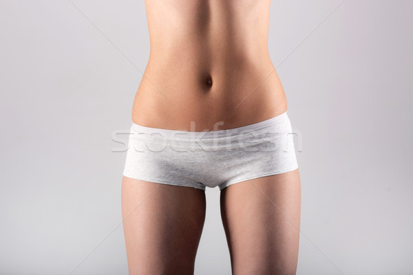 Stockfoto: Mooie · slank · vrouwelijke · cijfer · grijs · lichaam
